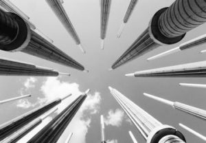 A black and white photo of some tall buildings